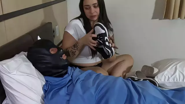 Poster: SOLES AND FOOT FETISH - - BELLATRIX PUNISHING HER MALE SLVE BY ORDERING HIM SNIFF AND LICK HER SNEAKERS SLIPPERS AN SOCKS